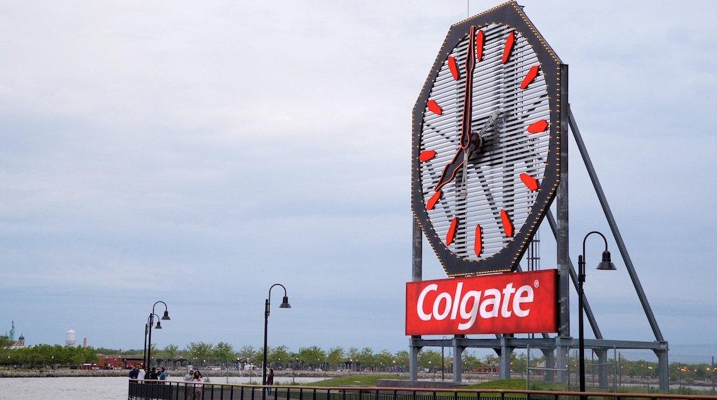 Colgate Clock showing a bay or harbour and signage