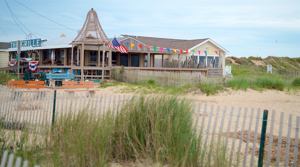 Sunset Beach which includes general coastal views, a coastal town and a sandy beach