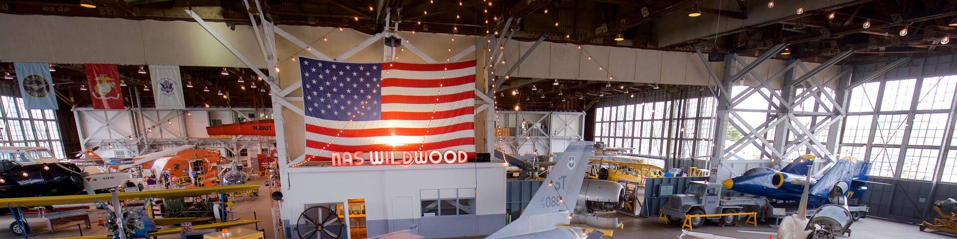 Naval Air Station Wildwood Aviation Museum which includes military items and interior views