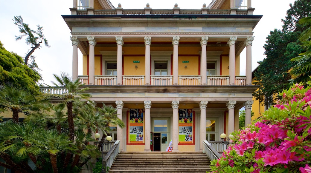 Villa Giulia showing a house, wildflowers and heritage elements