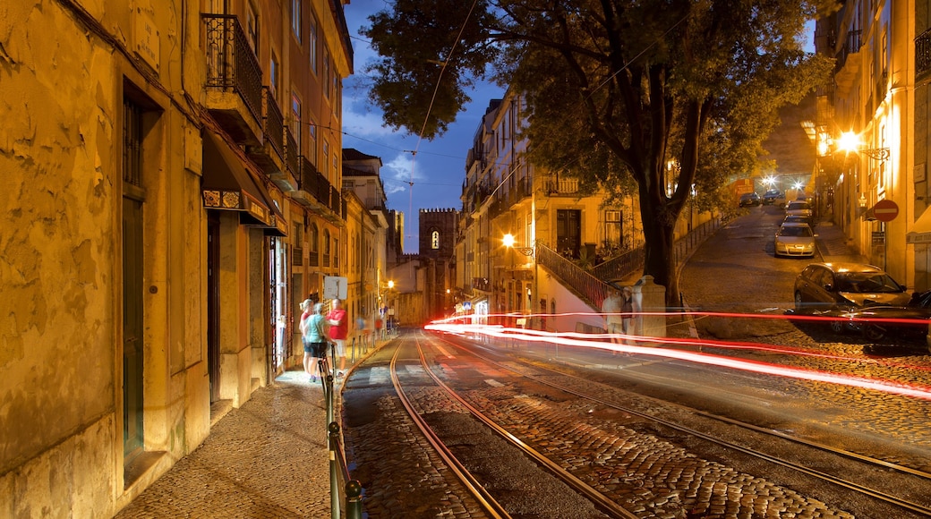 Alfama which includes night scenes