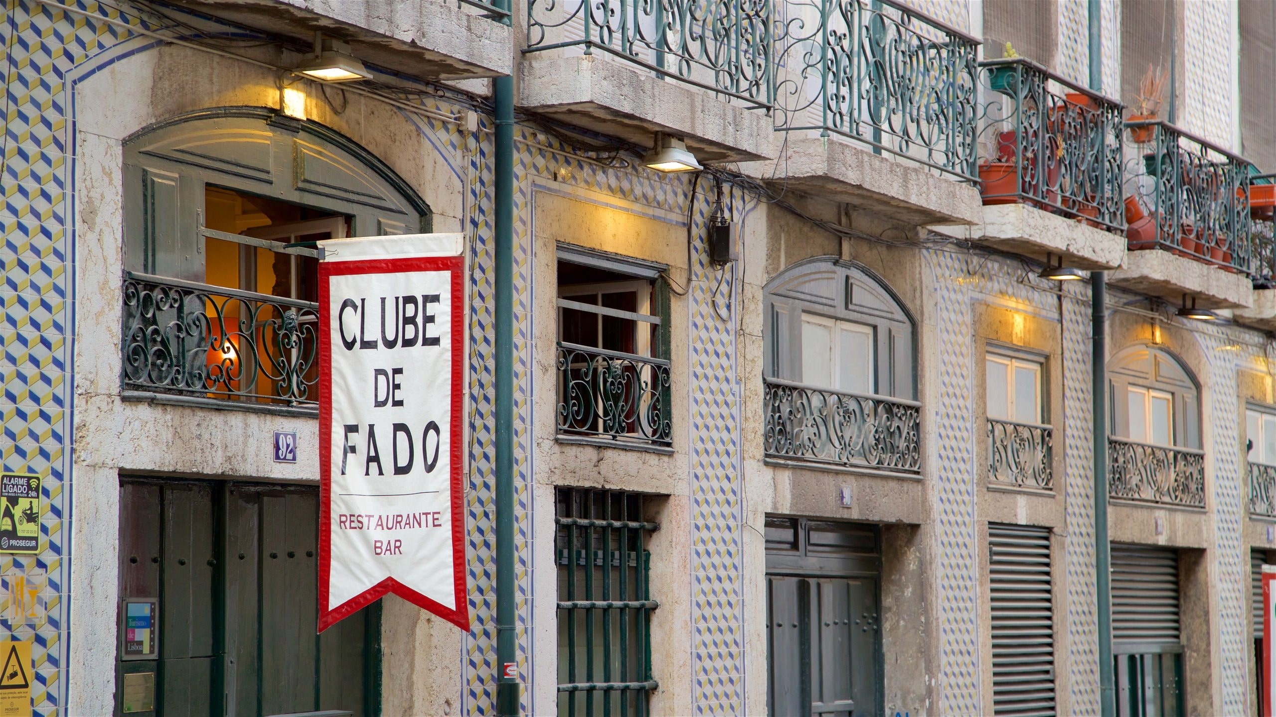 Alfama showing signage