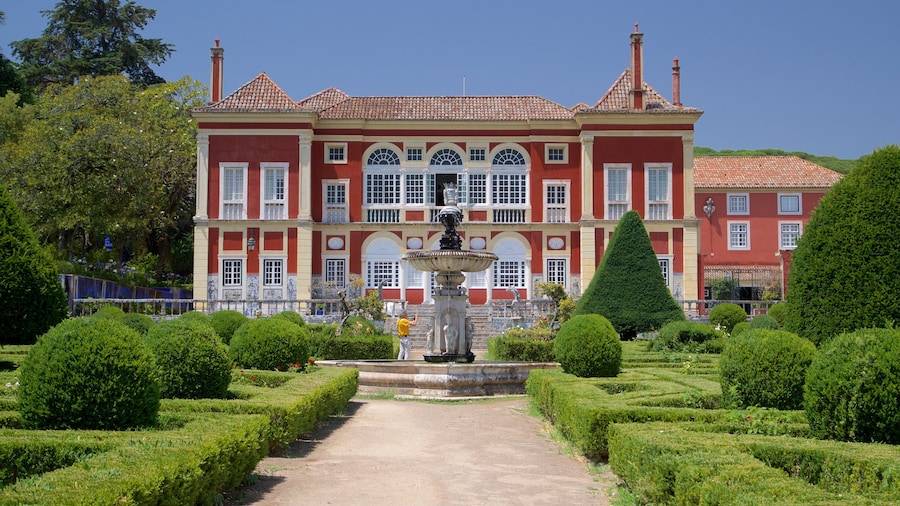 Palace of the Marquises featuring a fountain, heritage elements and a house