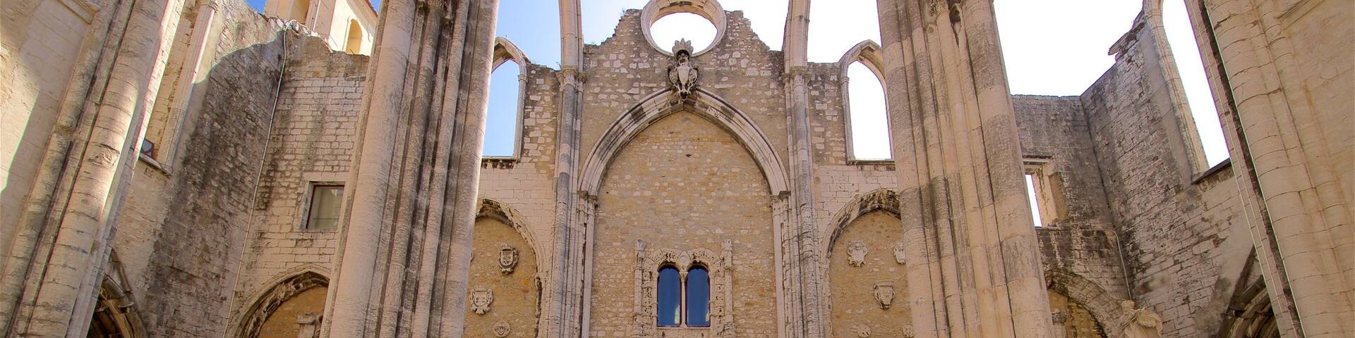 Carmo Convent showing heritage architecture and street scenes as well as an individual male
