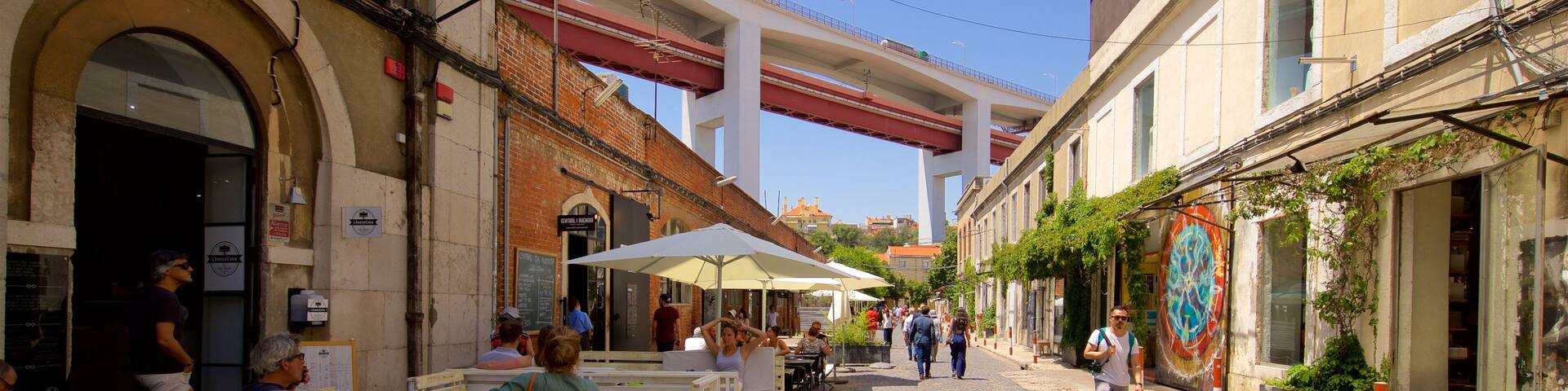 Lisbon District showing street scenes as well as a small group of people