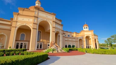 Sight and Sound Theatres showing outdoor art, heritage architecture and a garden