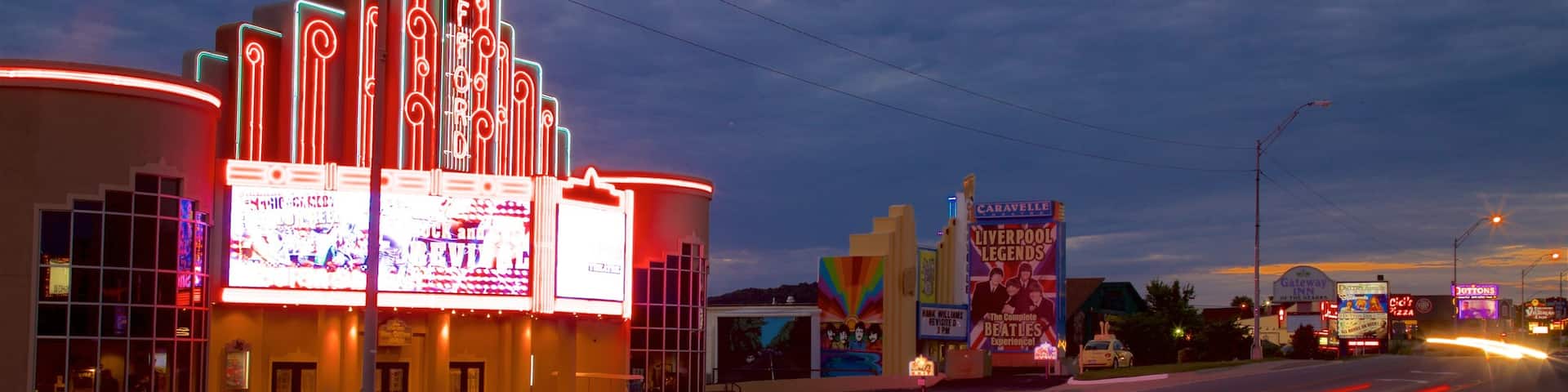 Hughes Brothers Theatre showing signage and night scenes
