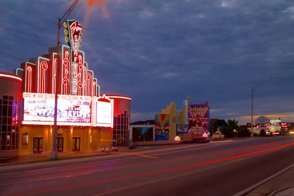 Hughes Brothers Theatre showing signage and night scenes