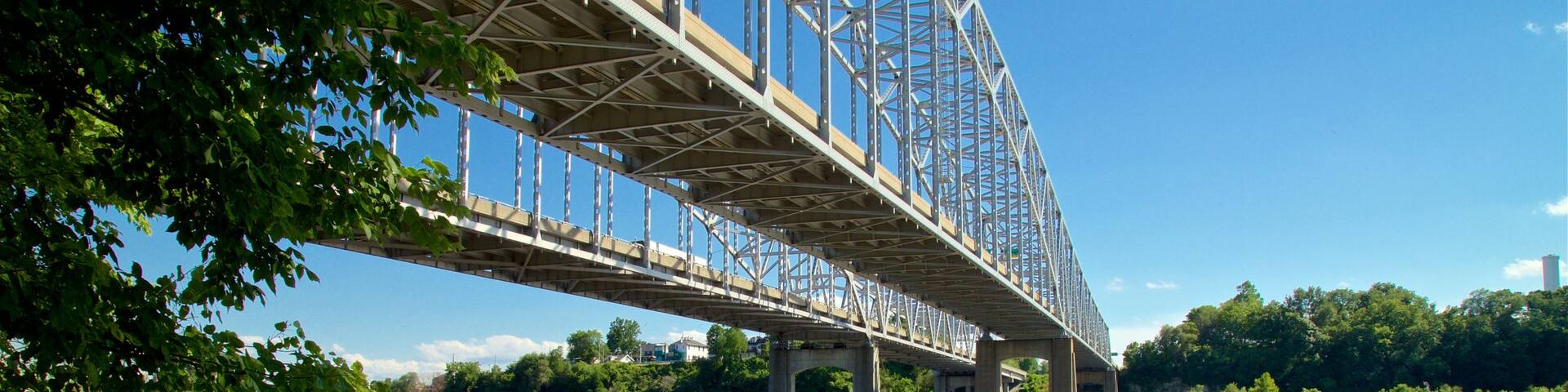 Jefferson City featuring a river or creek and a bridge