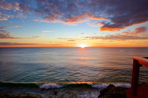Point Danger showing general coastal views, landscape views and a sunset