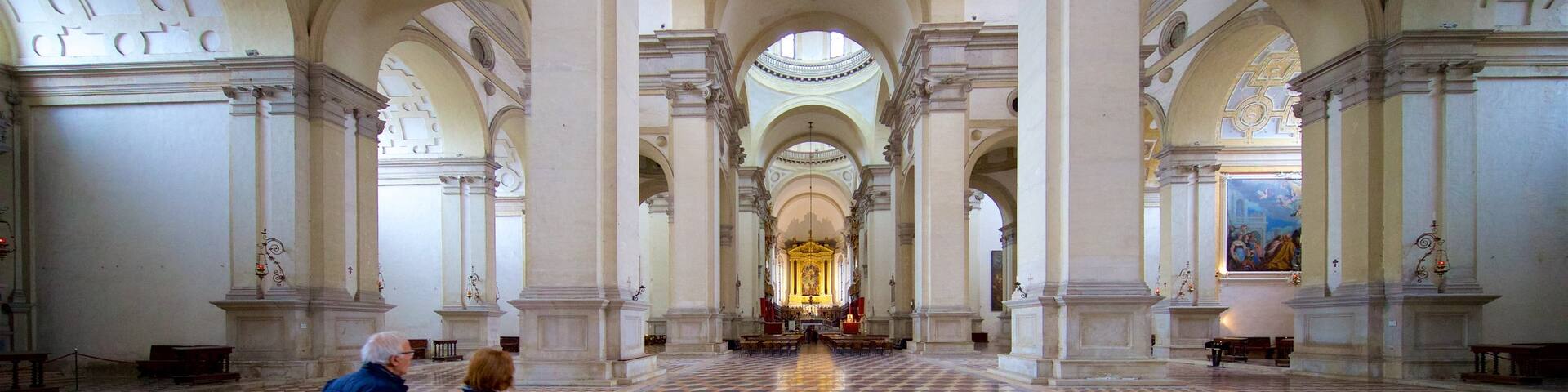 Basilica of St. Giustina featuring heritage elements and interior views as well as a couple