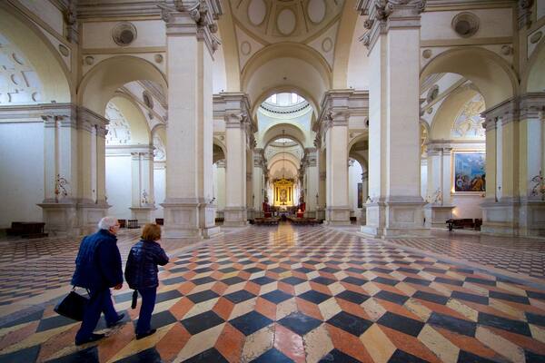 Basilica of St. Giustina featuring heritage elements and interior views as well as a couple