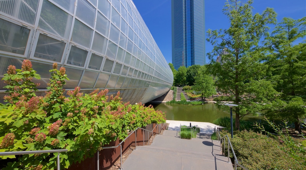 Myriad Botanical Gardens showing a park, a skyscraper and a river or creek