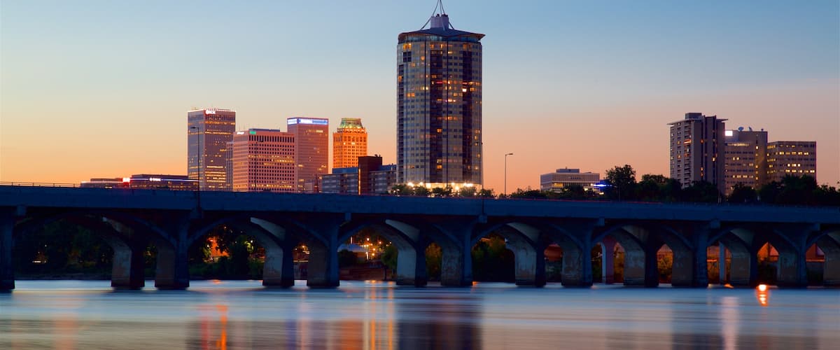 Tulsa featuring a sunset, a city and a high-rise building
