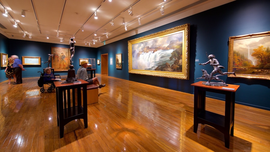 Gilcrease Museum featuring interior views and art as well as a small group of people