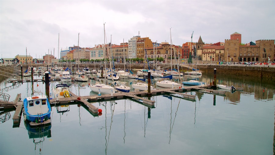 Cimadevilla which includes a city and a bay or harbor