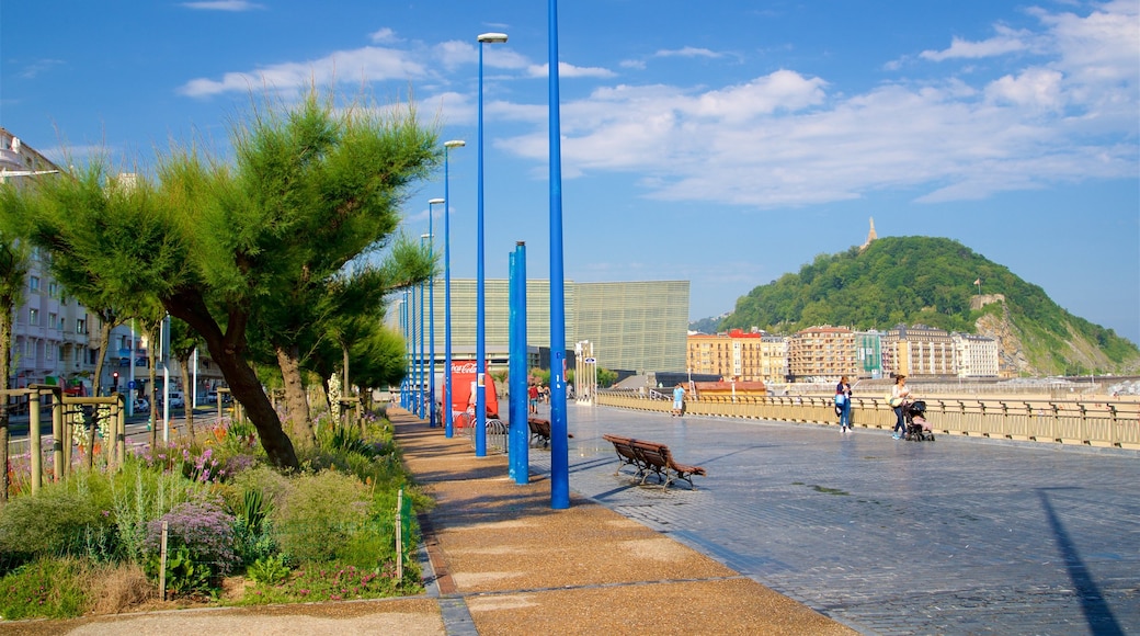 Zurriola Beach showing a park and a coastal town