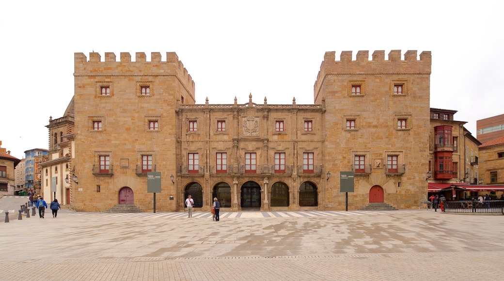 Palacio de Revillagigedo featuring a square or plaza and heritage architecture