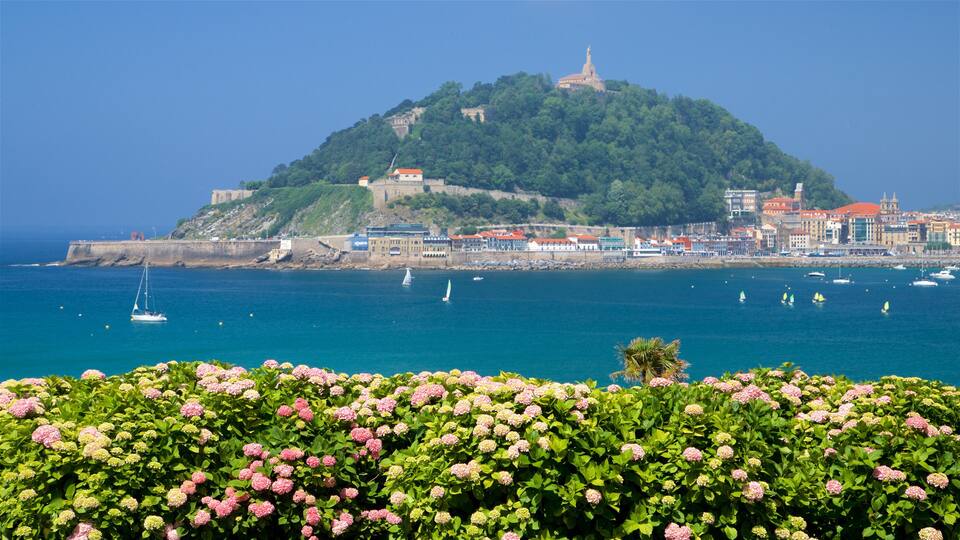 Miramar Palace showing general coastal views, flowers and a coastal town
