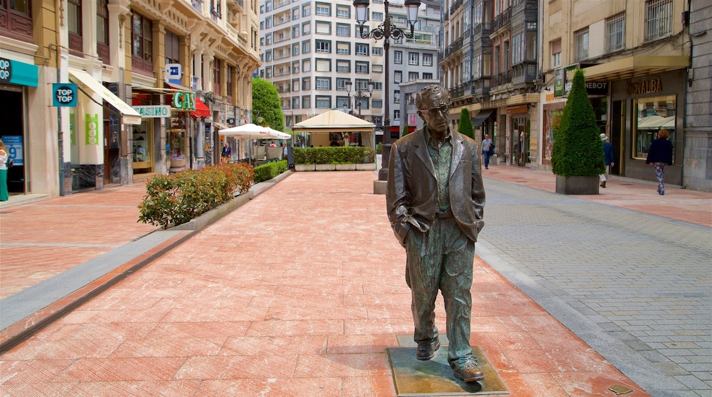 Woody Allen Statue which includes a city and a statue or sculpture