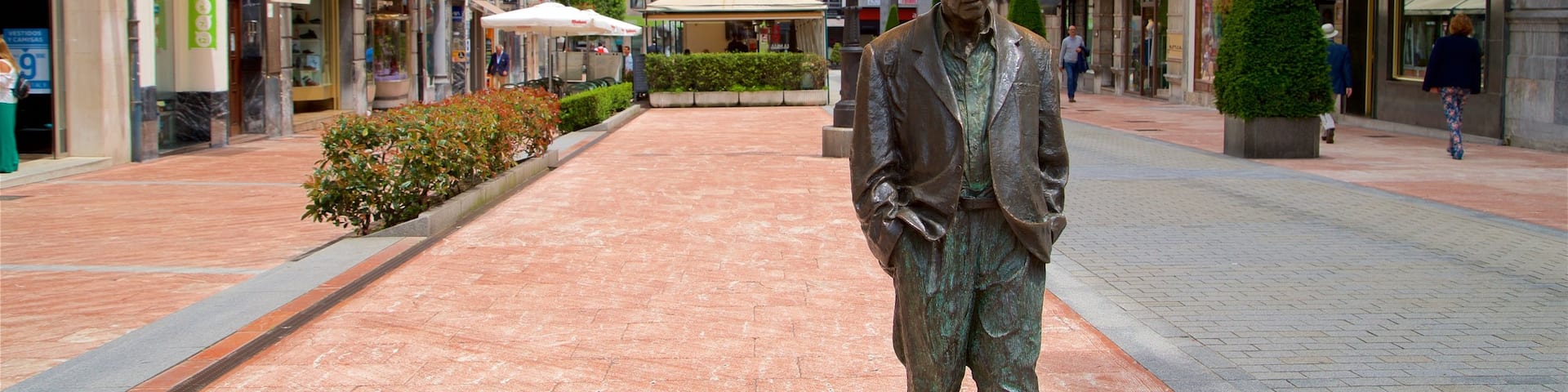 Woody Allen Statue which includes a city and a statue or sculpture