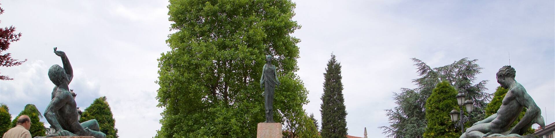 Plaza de Espana which includes a garden and a statue or sculpture