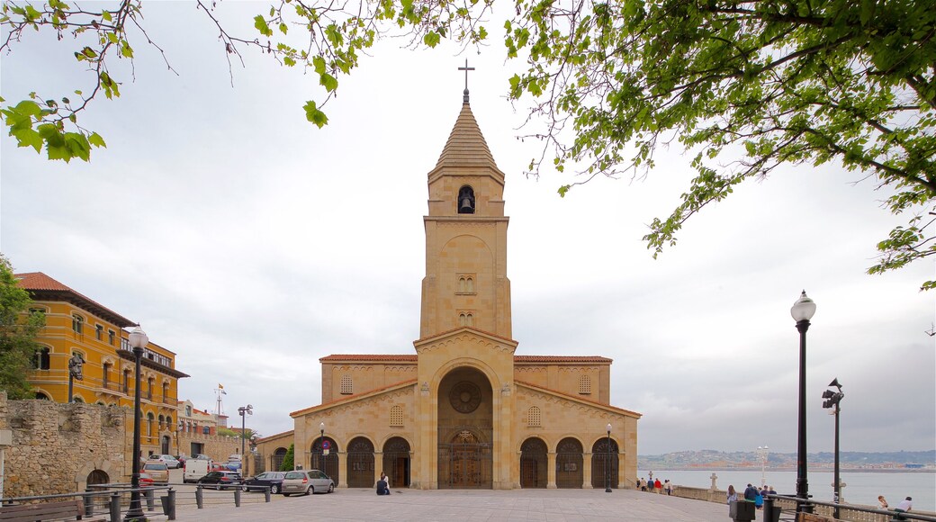 Gijon featuring heritage architecture, a river or creek and a church or cathedral