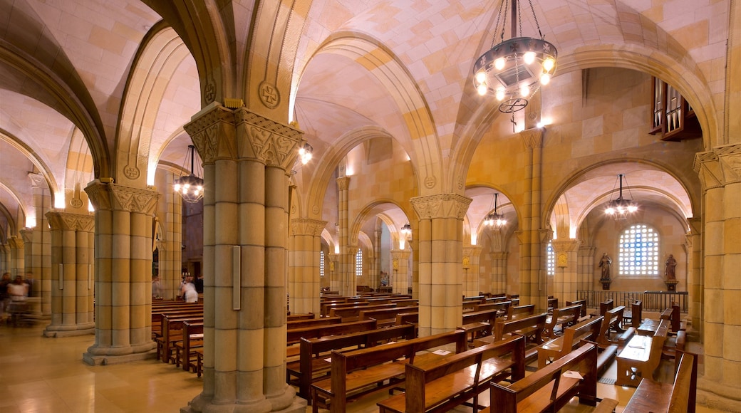 Gijon which includes heritage elements, a church or cathedral and interior views