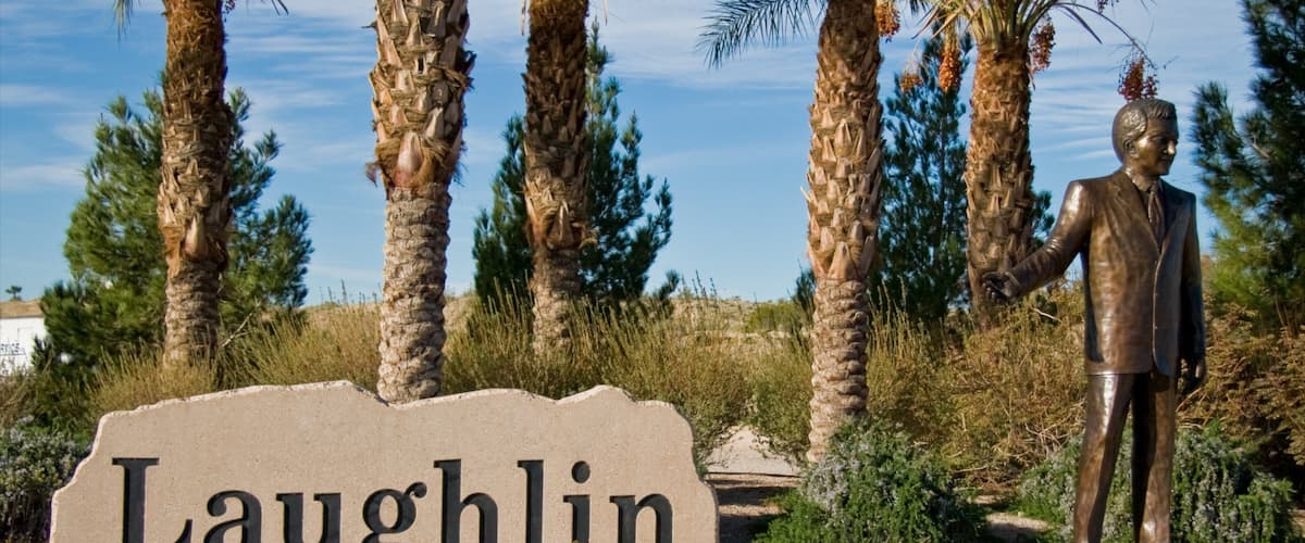 Laughlin showing a monument, a statue or sculpture and signage