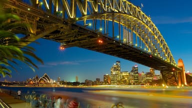 Sydney featuring night scenes, a bridge and a river or creek