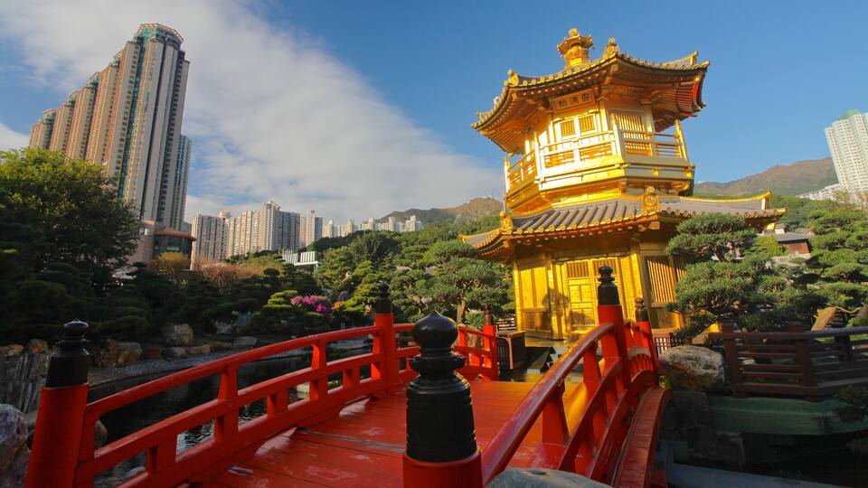 Hong Kong showing a temple or place of worship, heritage architecture and a city