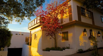 Carmel featuring autumn leaves, a house and a sunset