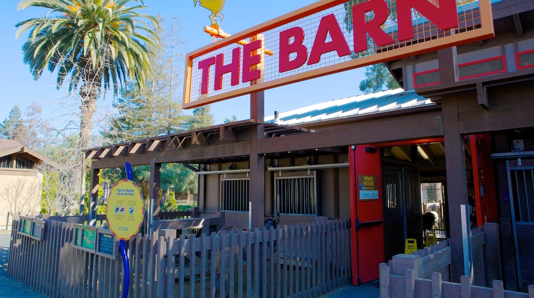 Happy Hollow Park and Zoo featuring signage and zoo animals