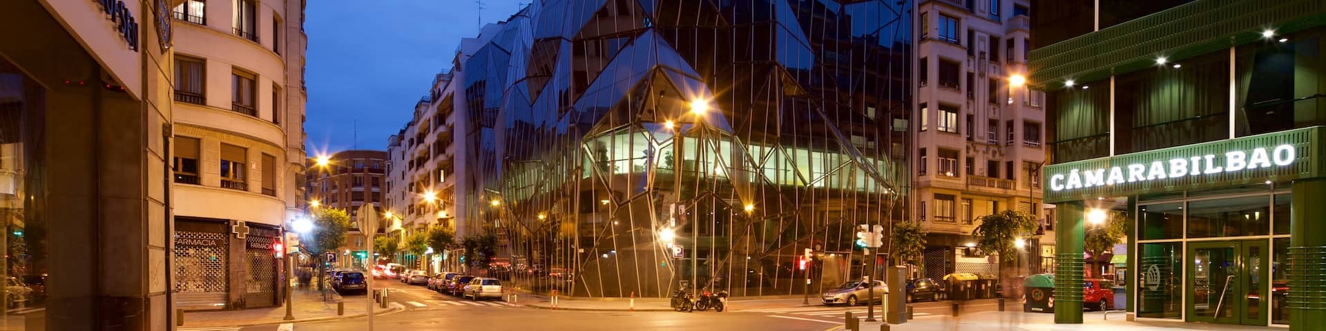 Bilbao showing a city, modern architecture and night scenes