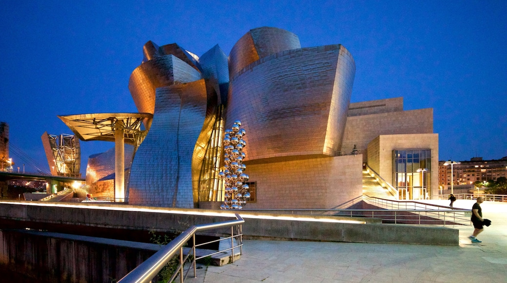 Guggenheim Museum Bilbao which includes night scenes and modern architecture