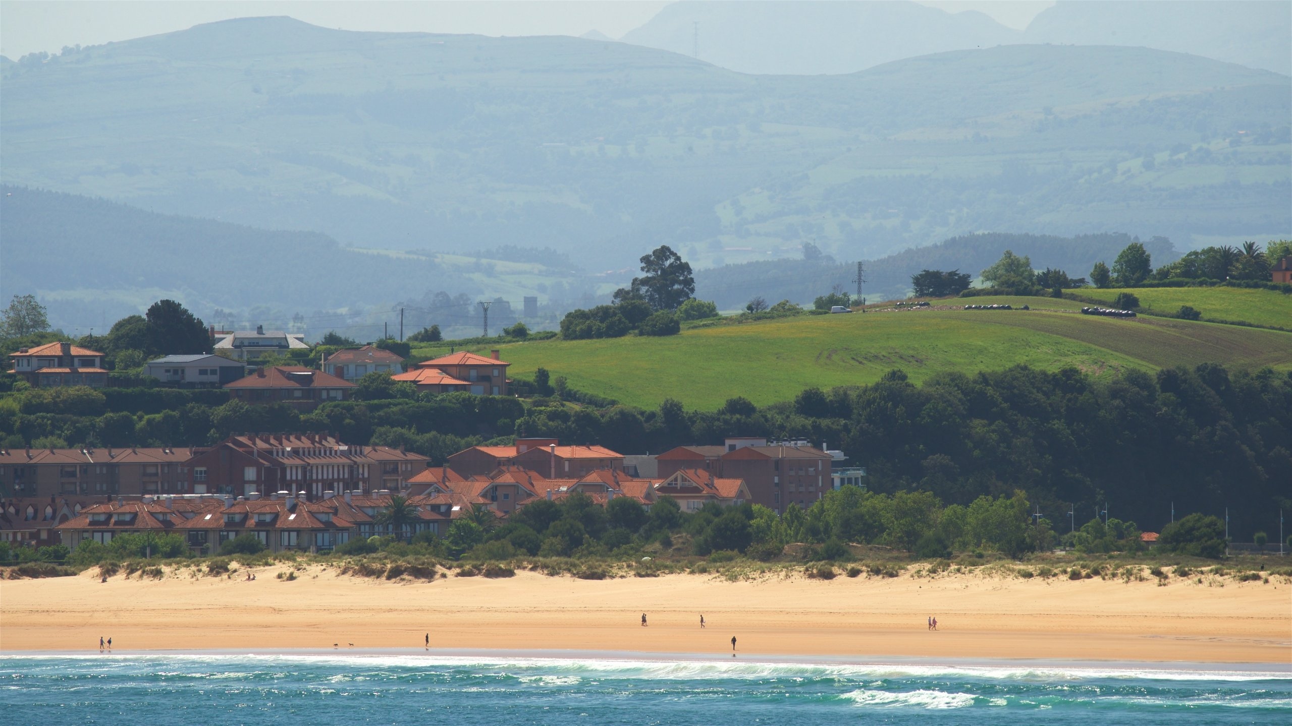 Santander showing tranquil scenes, a coastal town and a beach
