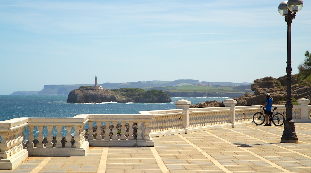 Magdalena Peninsula which includes a lighthouse, views and general coastal views