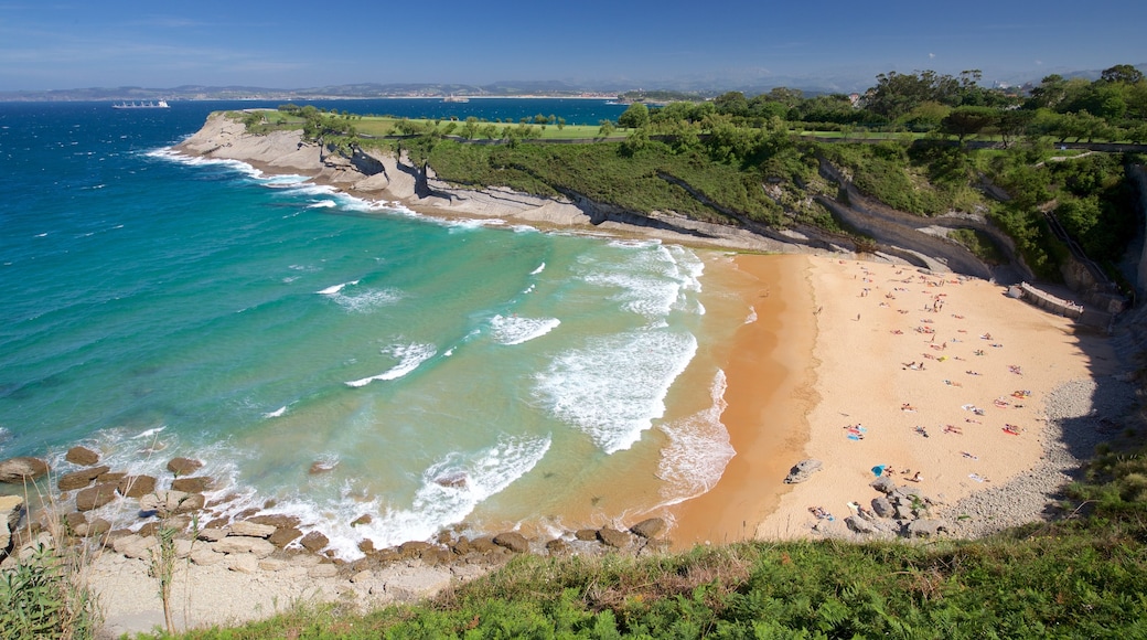 Santander showing rugged coastline, a sandy beach and general coastal views