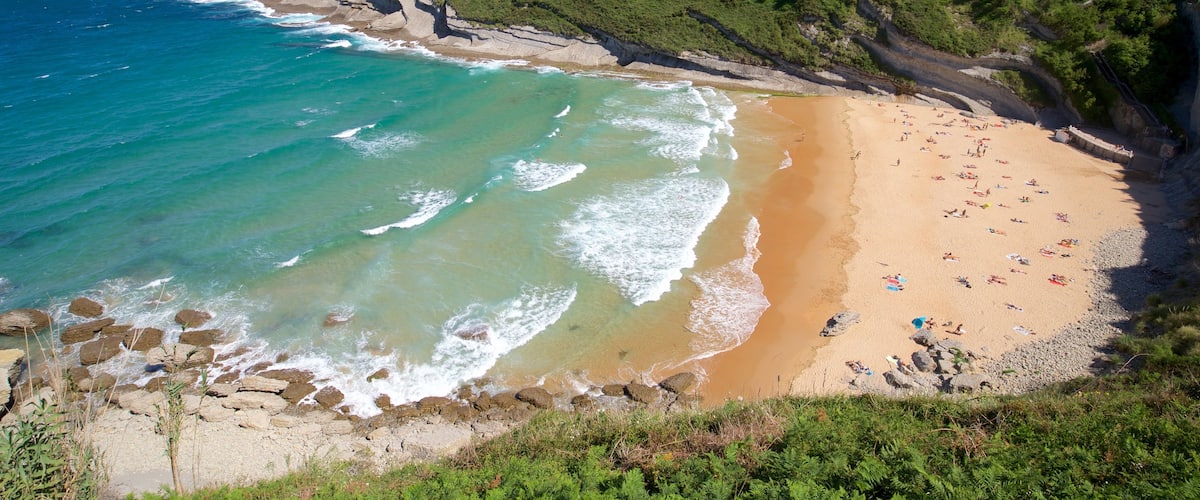 Santander mostrando costa escarpada, una playa y vistas generales de la costa
