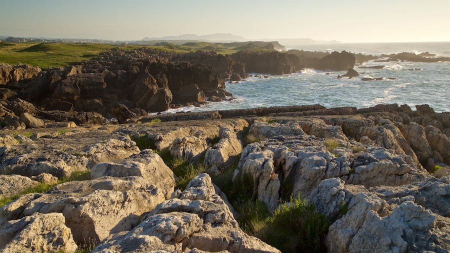 Santander - Cantabrian Coast which includes general coastal views, rugged coastline and a sunset