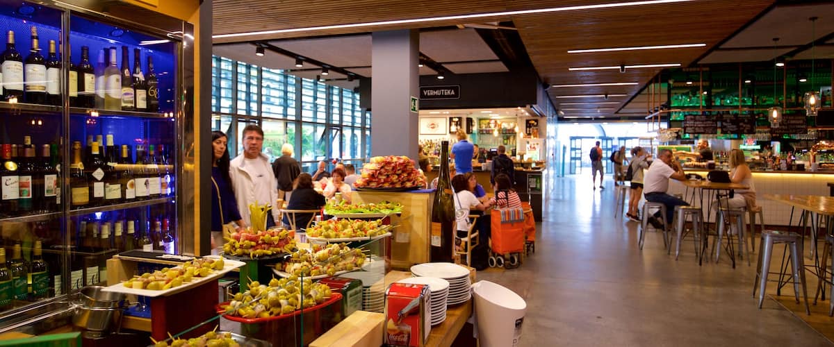 Ribera Market which includes interior views, food and a bar