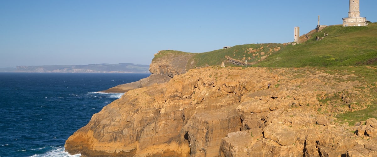 Cabo Mayor Lighthouse which includes a lighthouse, rocky coastline and general coastal views