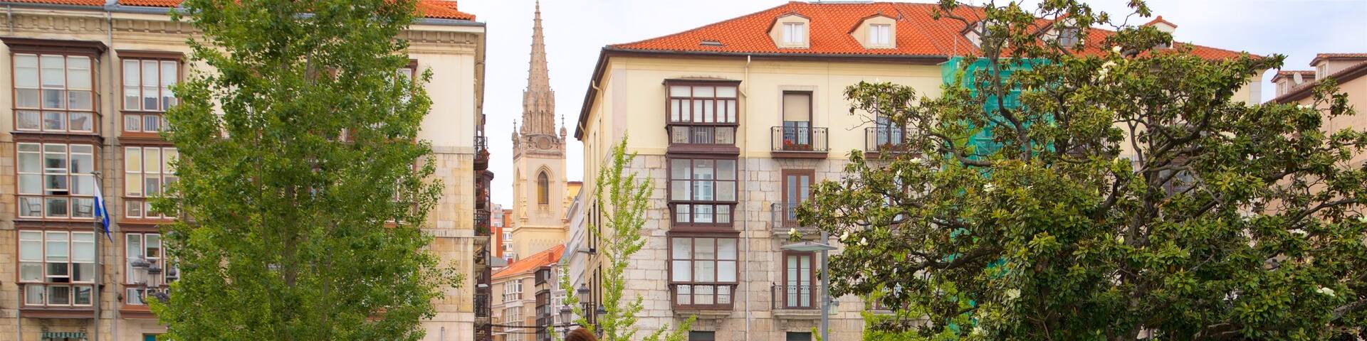 Jardines de Pereda featuring a river or creek, a bridge and hiking or walking