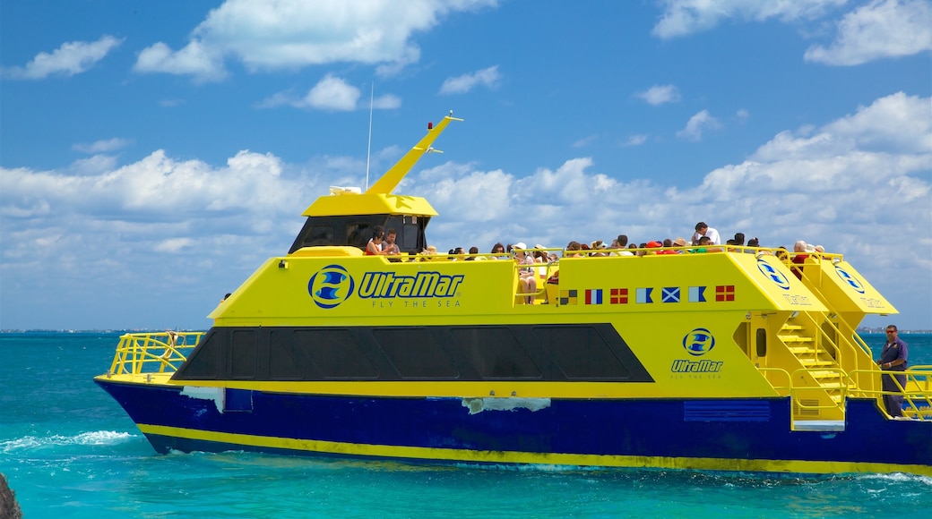 Playa Tortuga featuring signage, general coastal views and cruising