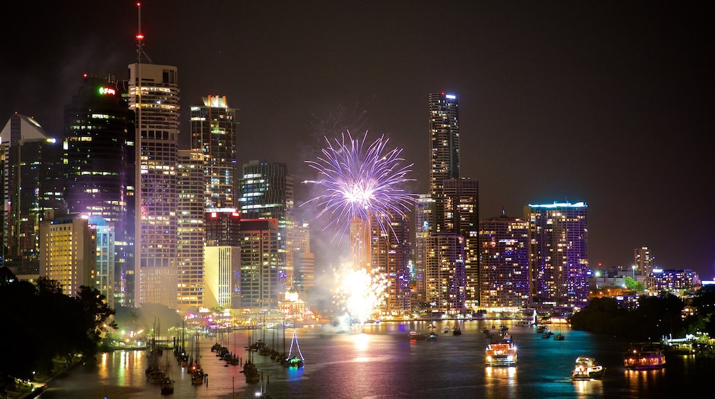 Kangaroo Point Cliffs which includes night scenes, a bay or harbour and a high-rise building