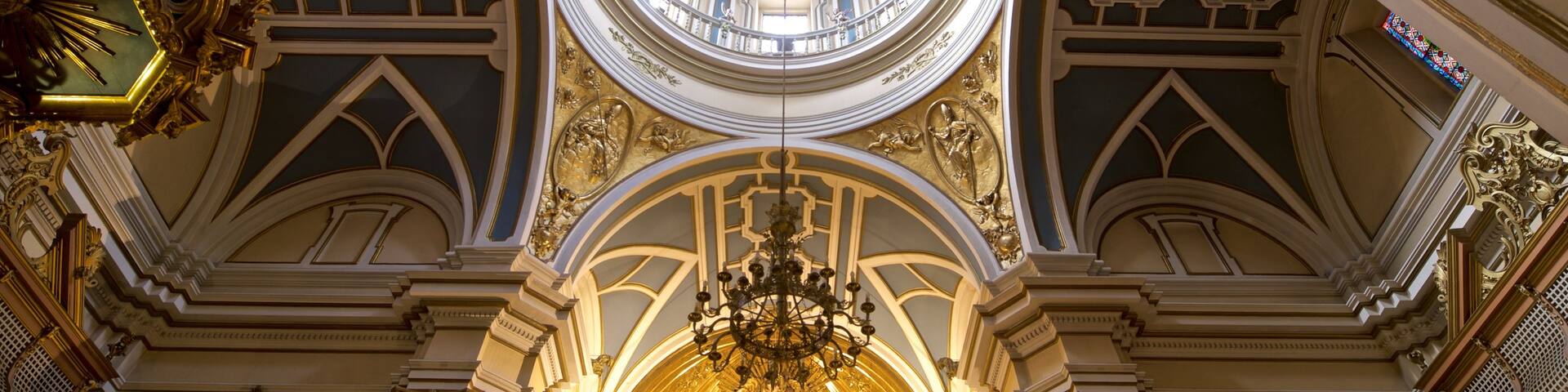 Church of San Saturnino featuring heritage elements and interior views