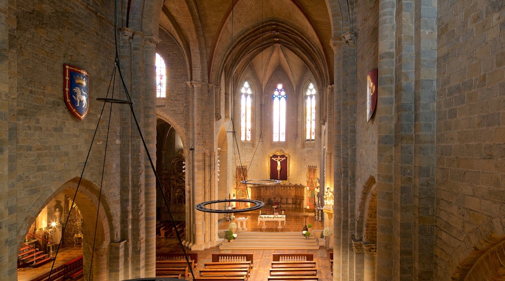 Iglesia de San Nicolas showing heritage elements, a church or cathedral and interior views