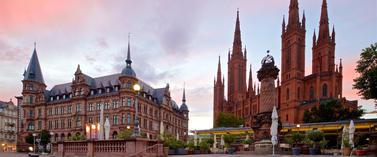 Marktbrunnen showing a church or cathedral, a sunset and heritage architecture
