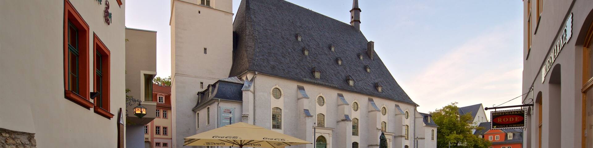 Stadtkirche St Peter und Paul featuring a sunset, heritage architecture and outdoor eating
