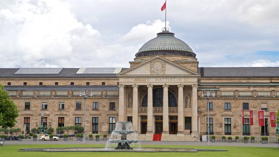 Kurhaus featuring heritage architecture, a fountain and a park